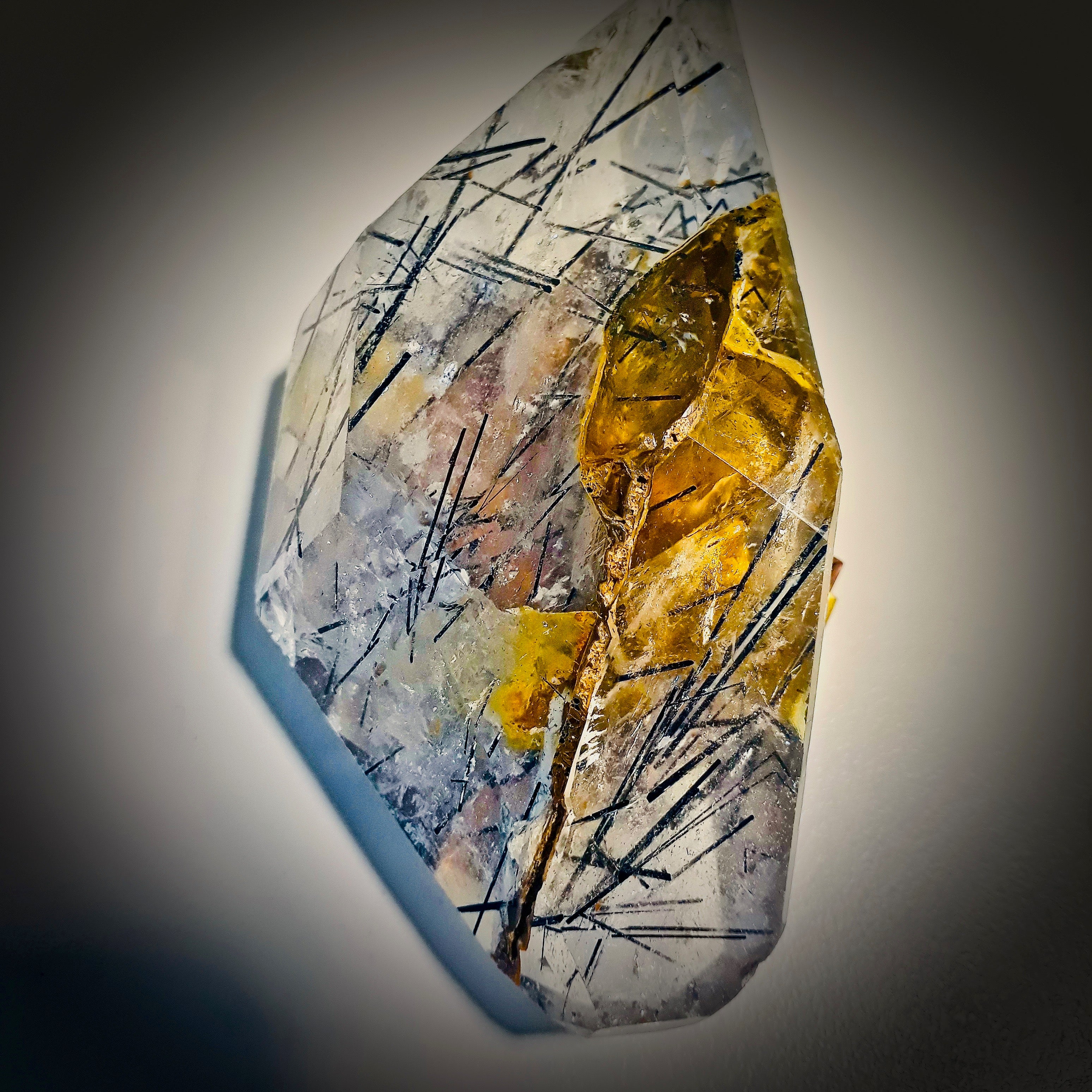 Quartz with black tourmaline and mud inclusions